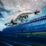 Ein Bild von Paraschwimmer Andreas Onea, wie er auf der Schwimmbahn trainiert - von unten unter Wasser fotografiert