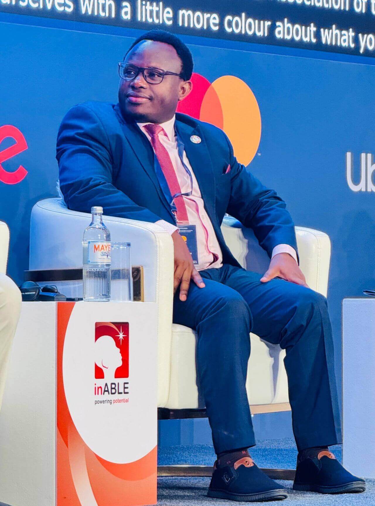 Ambrose Murangira, Thematic Director for Disability Inclusion at Light for the World, taking part in a panel at the Inclusive Africa Conference 2024.