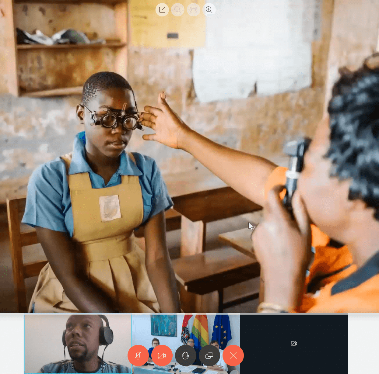 Screenshot from an online press conference with Johannes Rauch, Austrian Minister for Social Affairs, Health, Care and Consumer Protection, and Silvester Kasozi, Country Director of Light for the World Uganda. The main image is a girl from Uganda having her eyes tested. In the bottom left hand corner, Silvester is presenting. In the bottom right hand corner, the other press conference participants are listening.